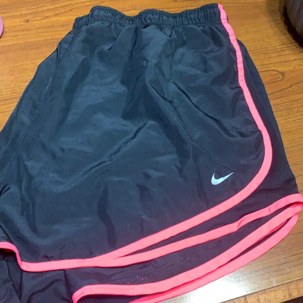 Plus size Nike shorts 3x black with bright pink on the sides.